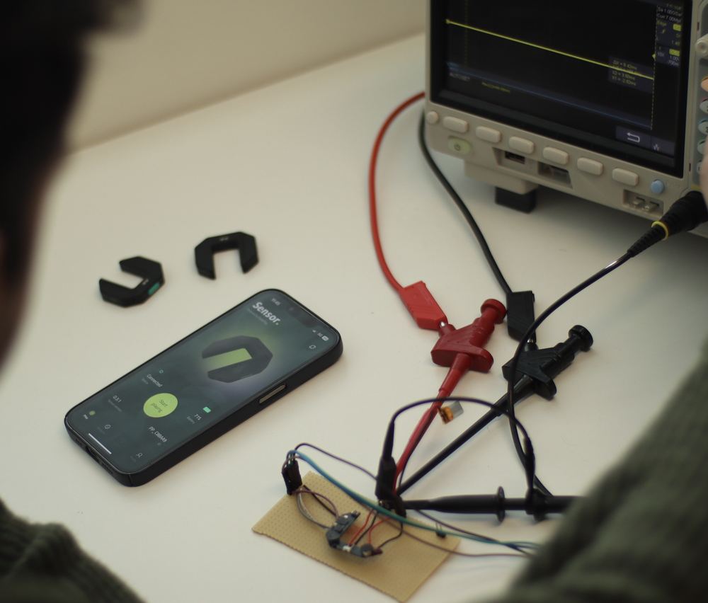 Sensor, companion app and scope — the full stack on one table.